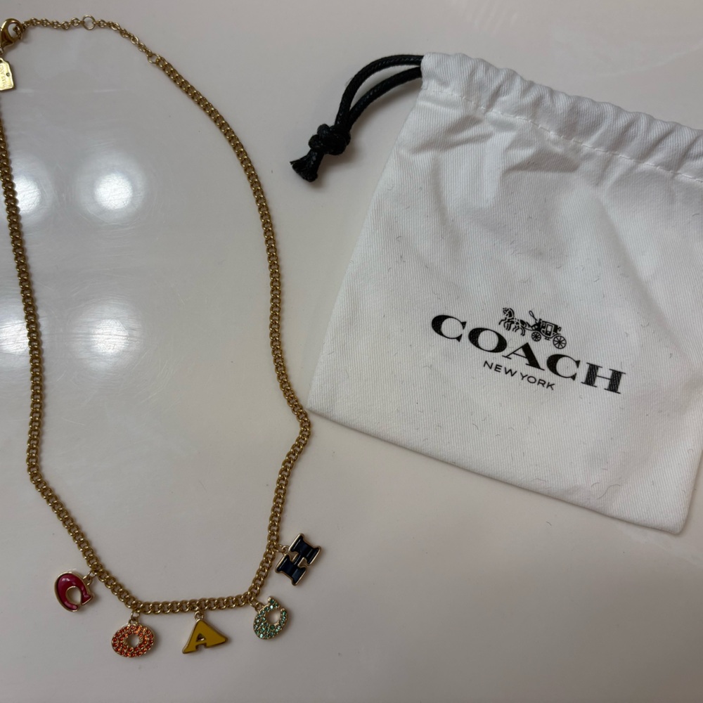 Coach charm necklace